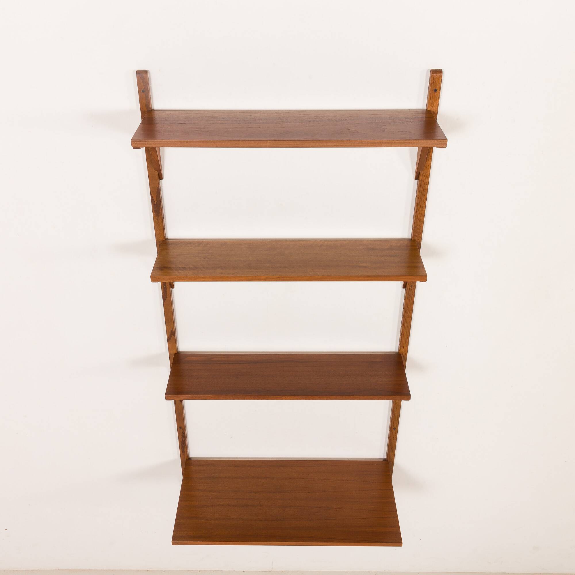 Danish mid-century walnut shelving unit in the style of Poul Cadovius, 1960s
