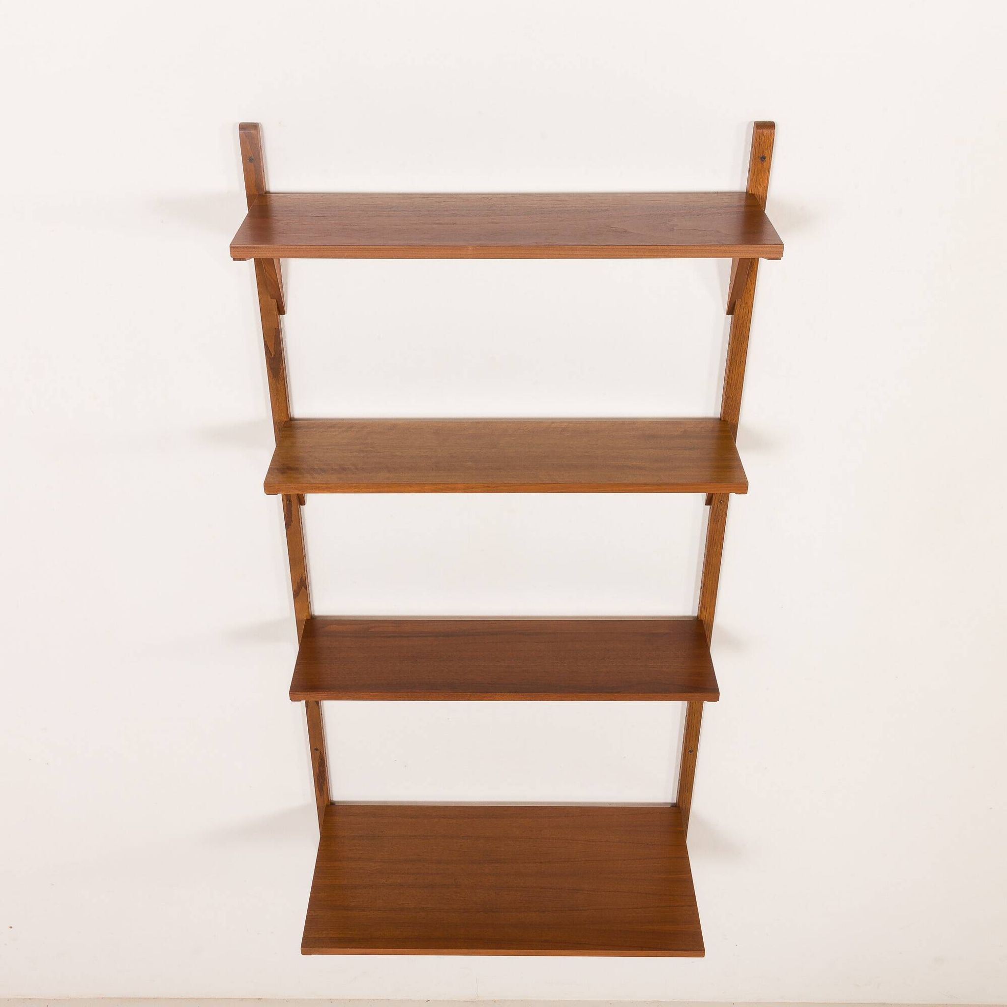 Danish mid-century walnut shelving unit in the style of Poul Cadovius, 1960s