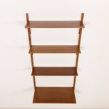 Danish mid-century walnut shelving unit in the style of Poul Cadovius, 1960s