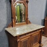 Buffet with mirror in Renaissance style, entirely made of solid walnut.