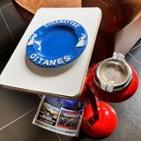 Red magazine ashtray on stand from the 70s