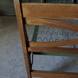 Bed with green metal braces 1960 a person foldable