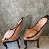 Pair of carved solid mahogany gondolas from the 19th century