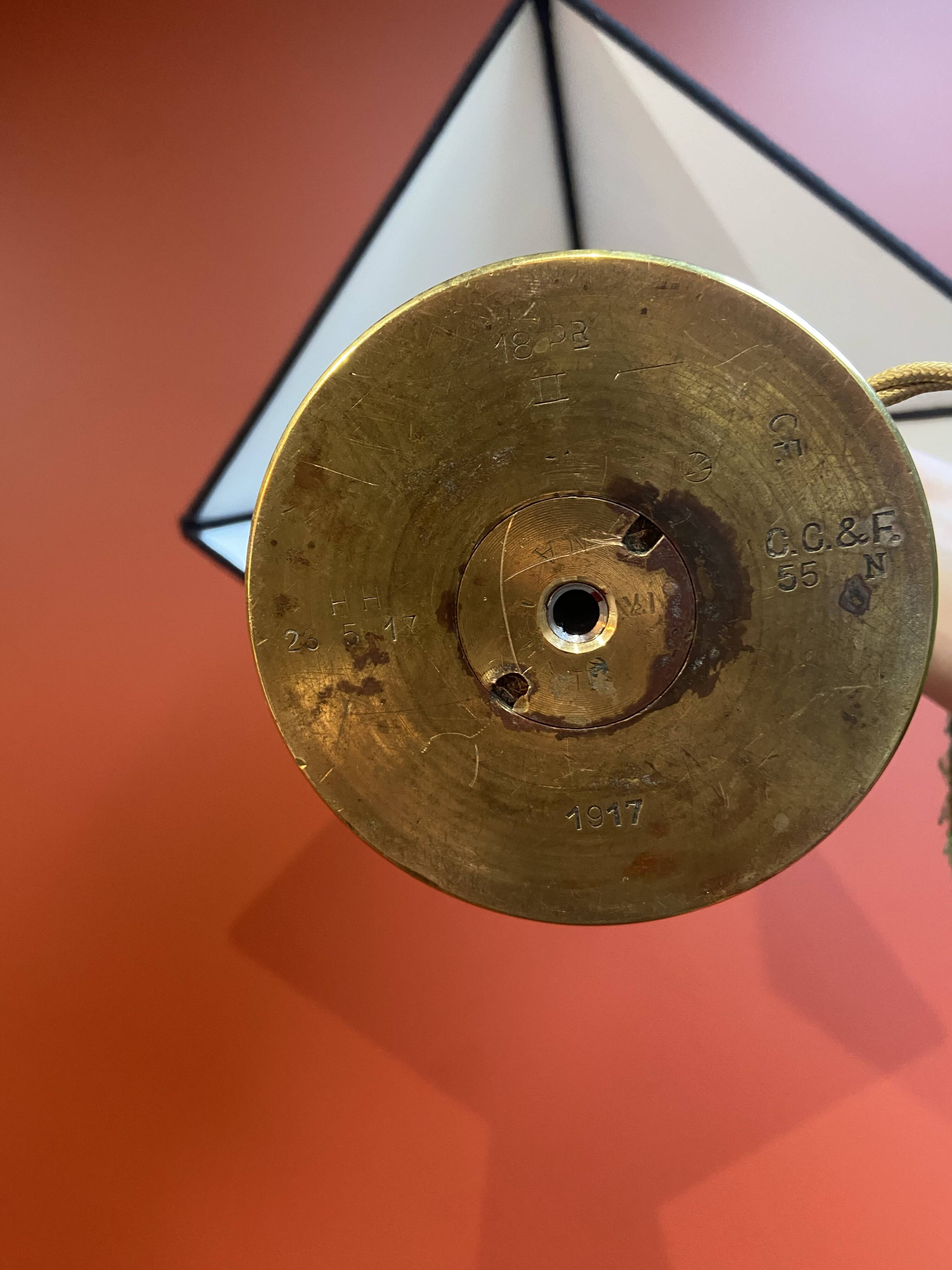 Brass shell socket lamp from the 1st WW, black pyramidal lampshade in Carlucci linen.