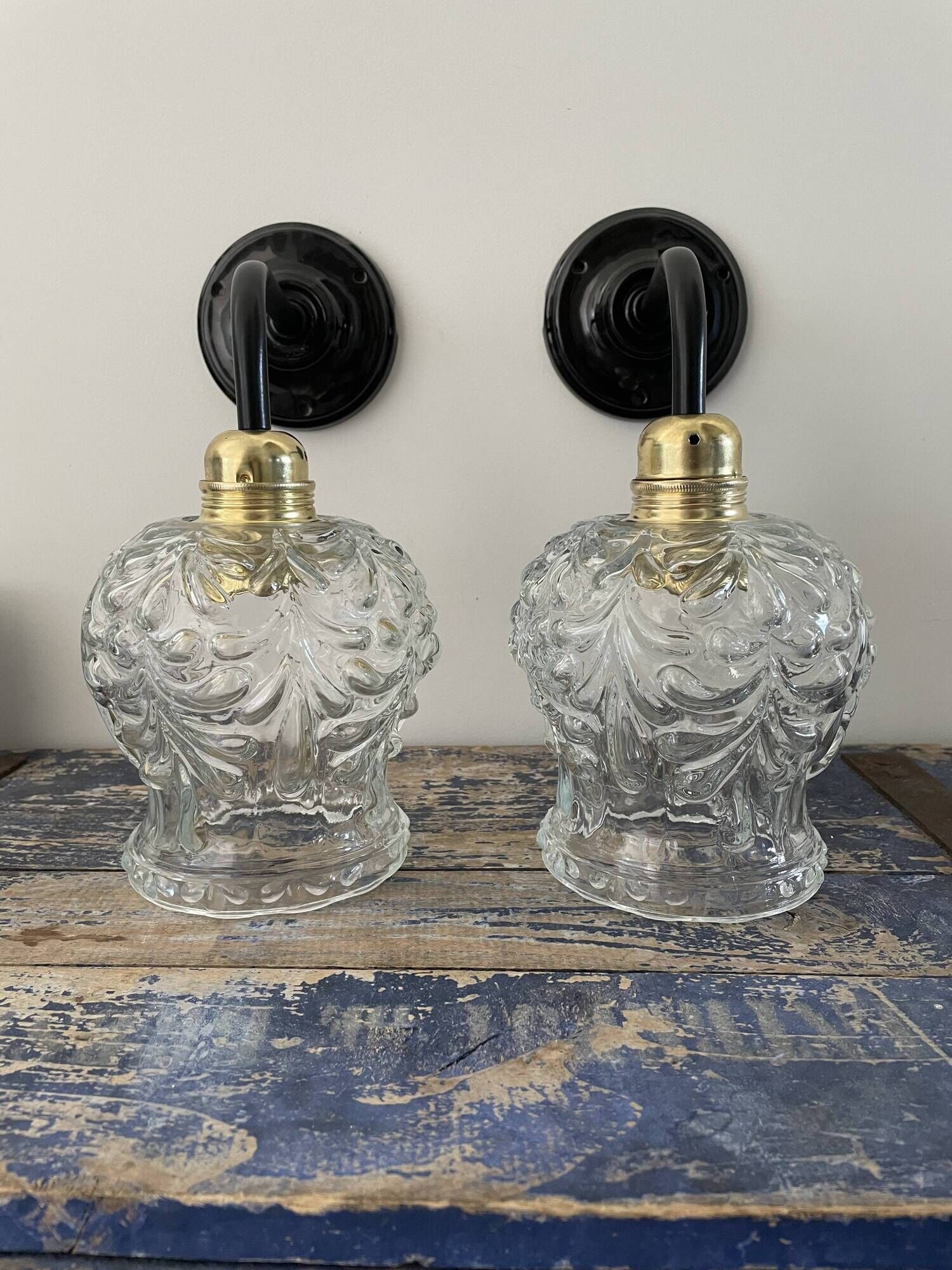 Pair of vintage electrified to nine-piece chiseled glass wall lamps