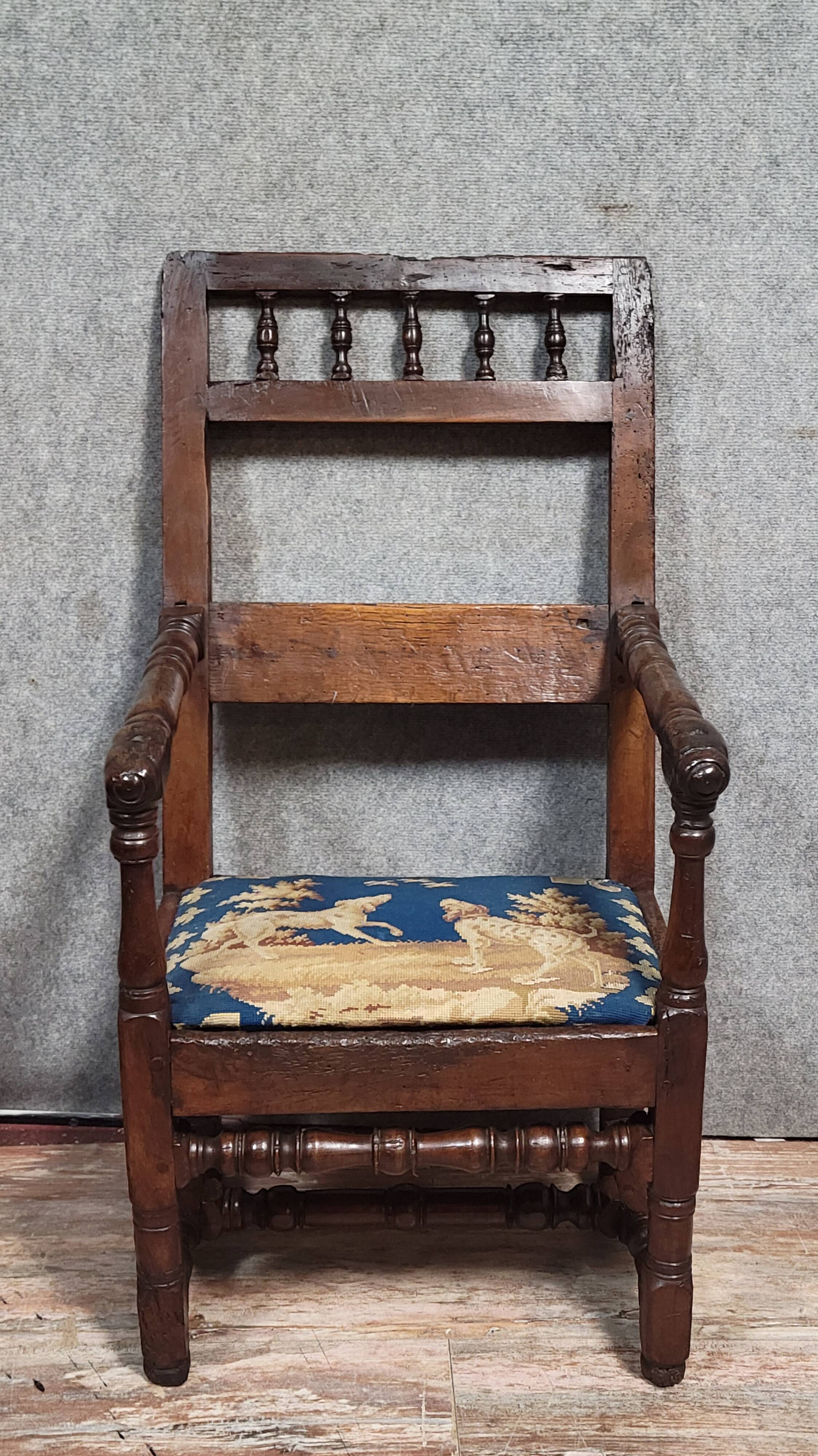 Louis XIII period armchair in solid wood