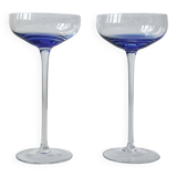2 cocktail glasses.