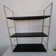 Metal string shelf