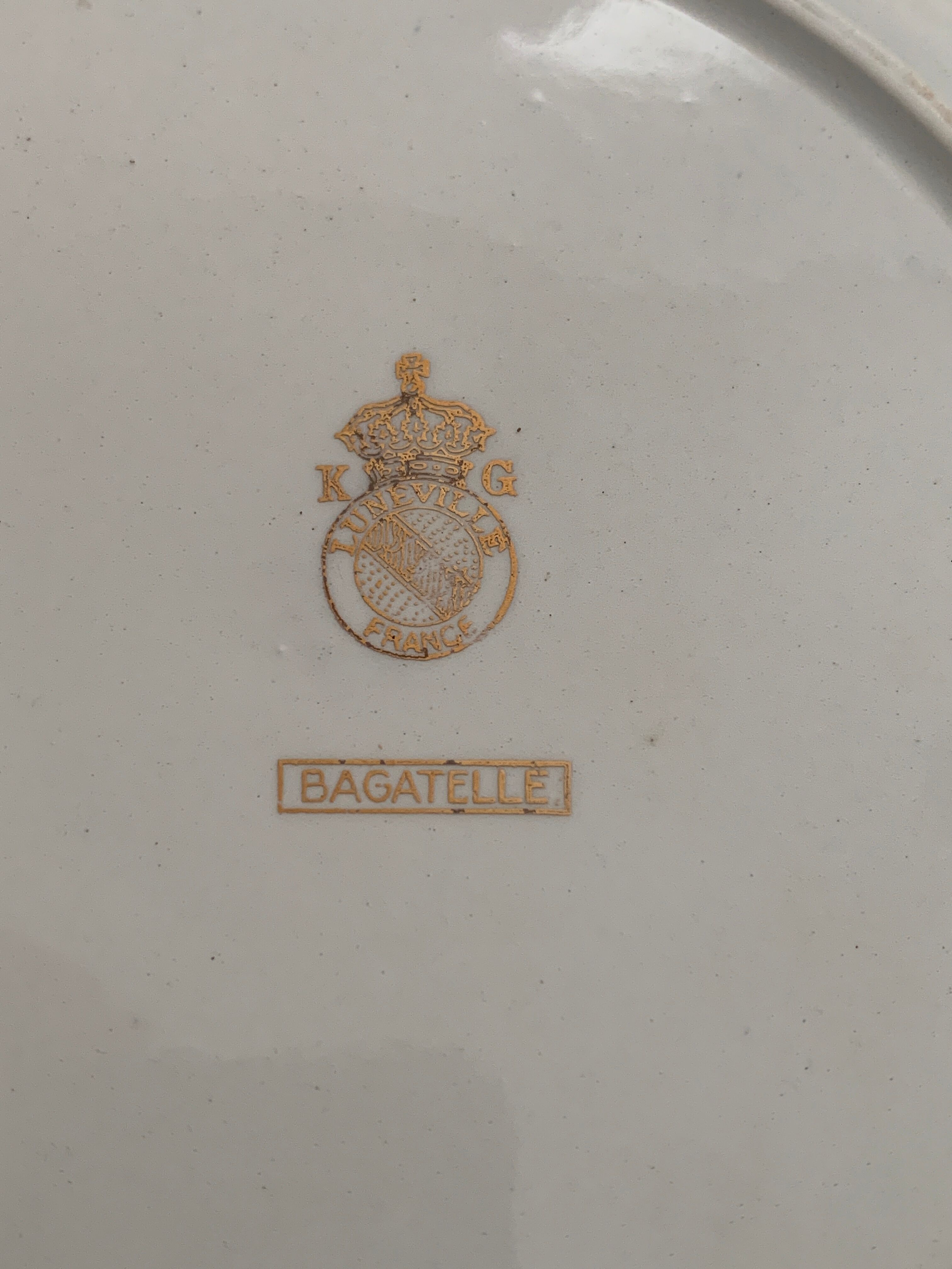 12 flat plates in flat earthenware KG Luneville bagatelle model, late 19th century