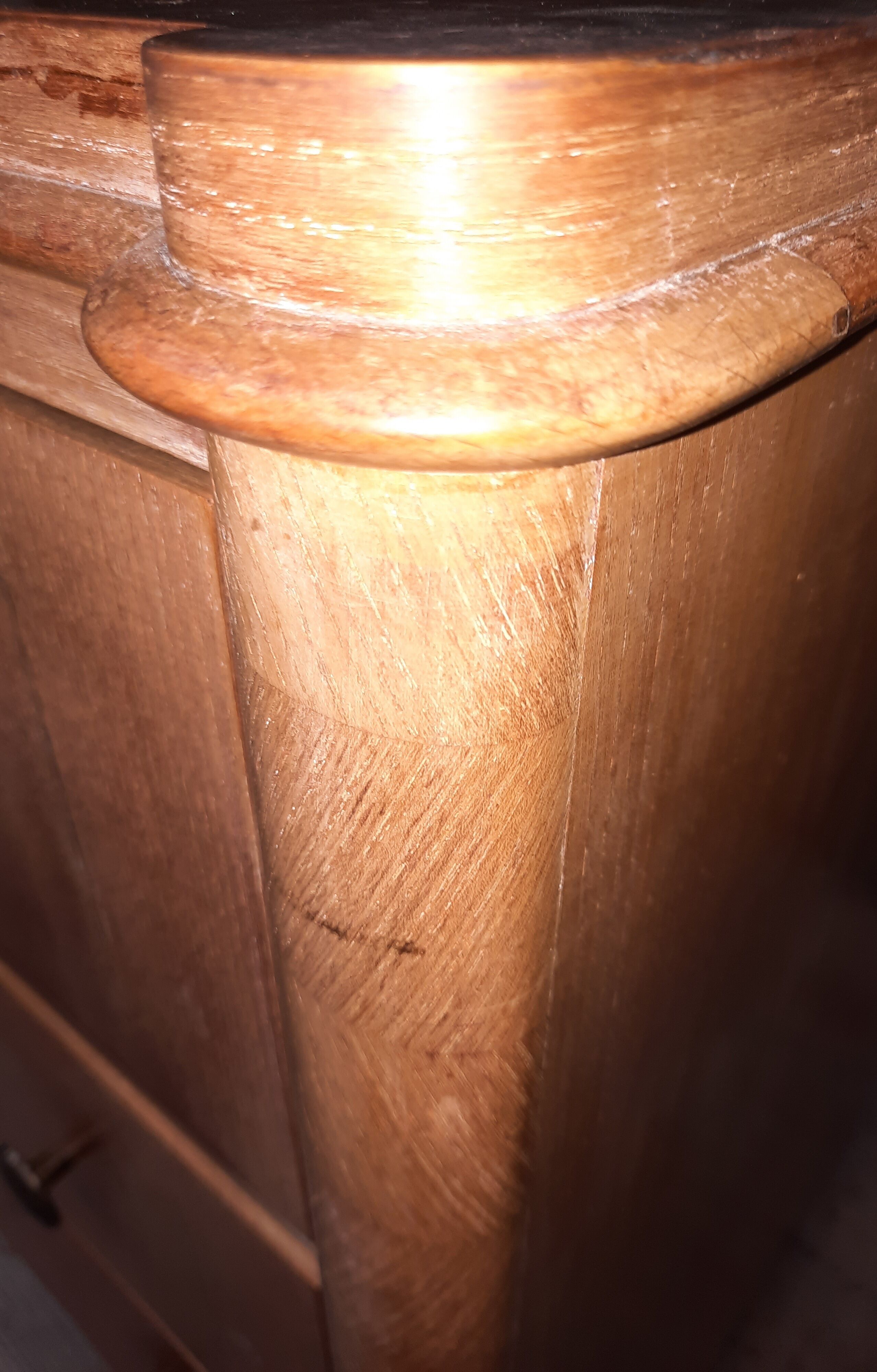 Vintage wooden chest of drawers with clear veneer