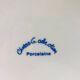 6 “Chriss G. Collection” porcelain dessert plates.