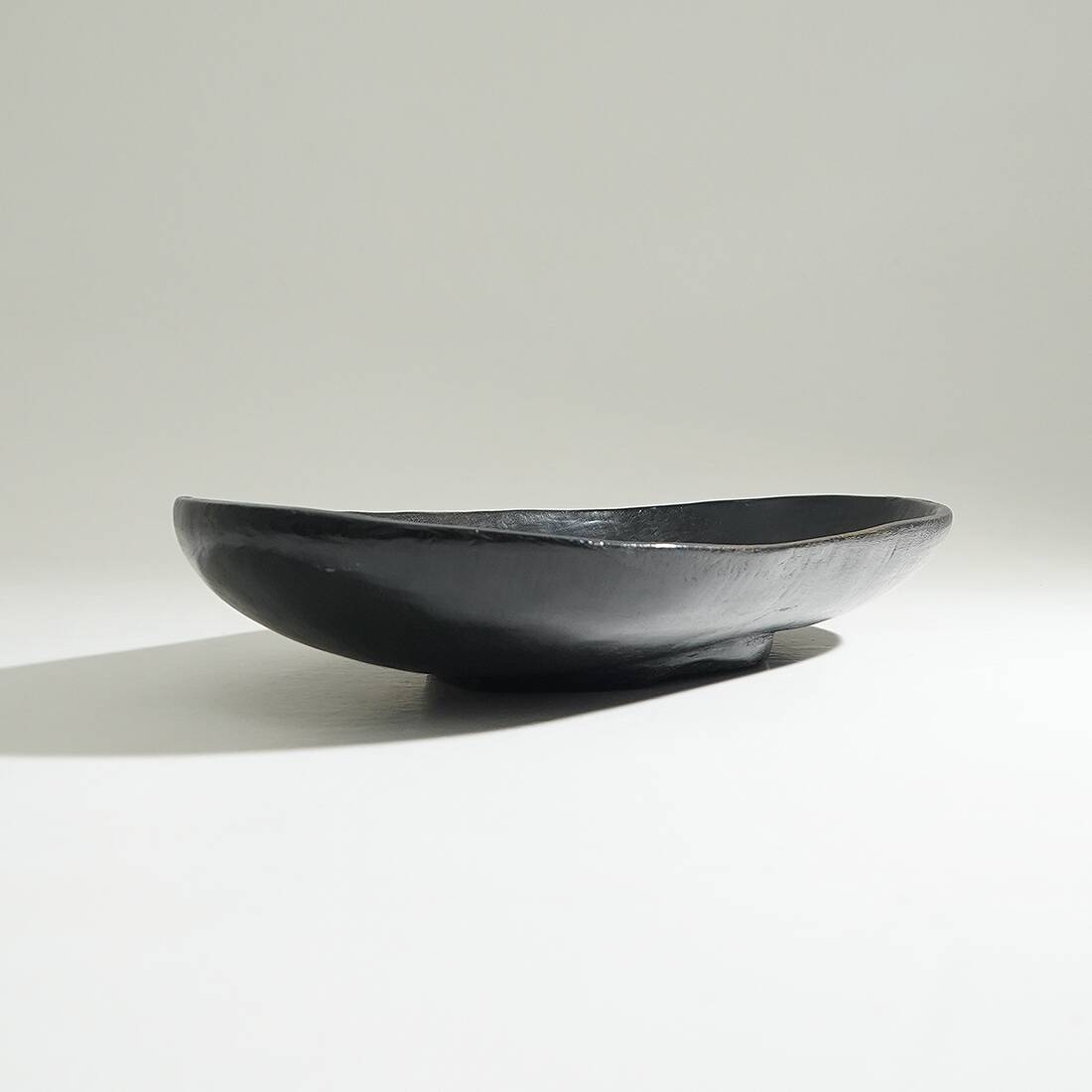 Organic shaped black wooden bowl, 1960s