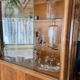 Art deco display cabinet in walnut and glass