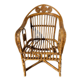 Wicker armchair with medallions