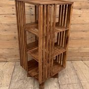 rotating library in Burmese teak
