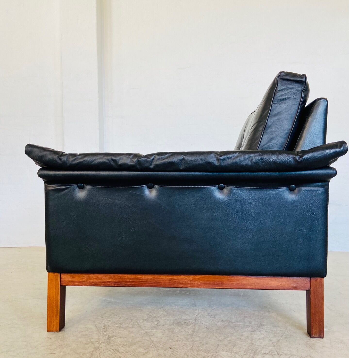 Vintage Danish mid-century black leather armchair – 1970s