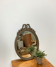 Vintage wooden mirror with arch and flowers