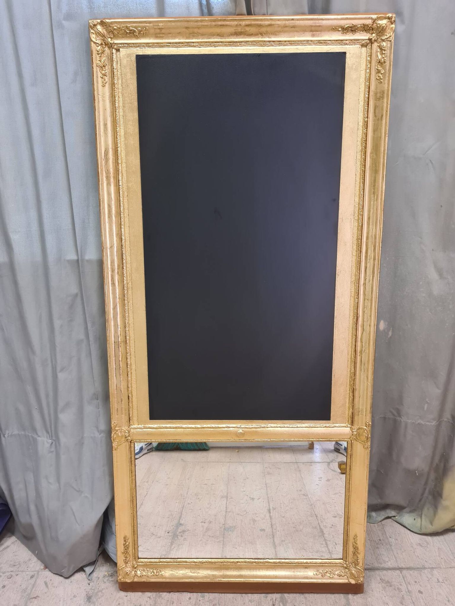 Golden trumeau mirror with restaurant slate, 19th century