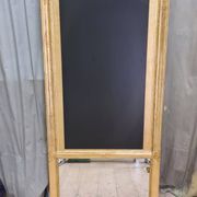 Golden trumeau mirror with restaurant slate, 19th century
