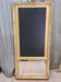 Golden trumeau mirror with restaurant slate, 19th century