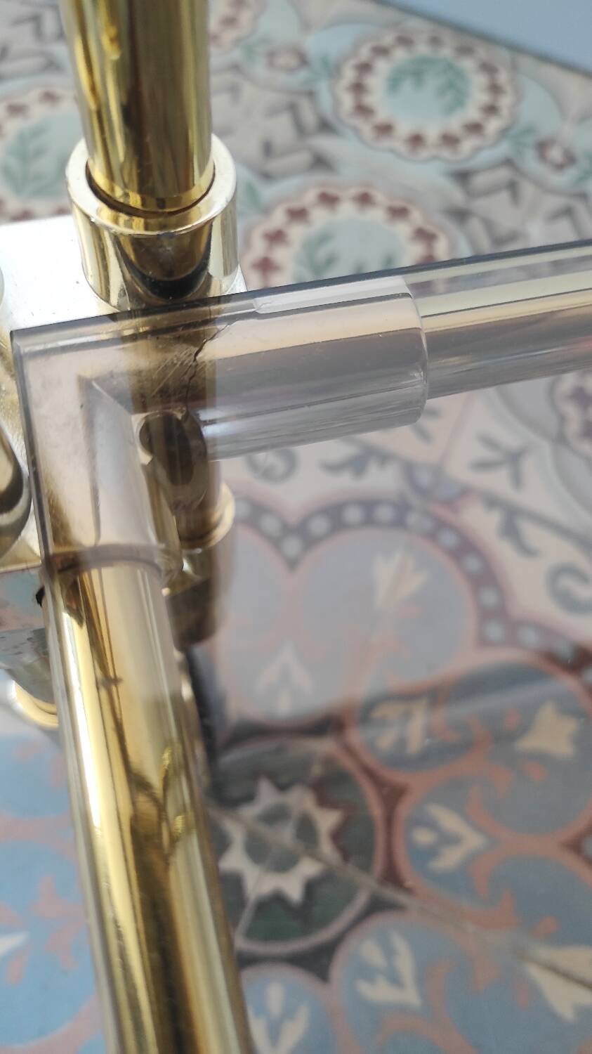 Dessert, vintage gold rolling bar, chrome and smoked glass.
