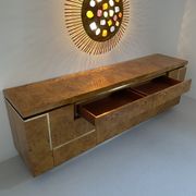 Sideboard in elm magnifying glass and brass. 1970