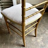 Napoleon III chair in gilded bamboo wood and beige cotton.