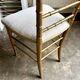 Napoleon III chair in gilded bamboo wood and beige cotton.