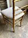 Napoleon III chair in gilded bamboo wood and beige cotton.