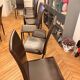 Many brown leather chairs "Roche Bobois"