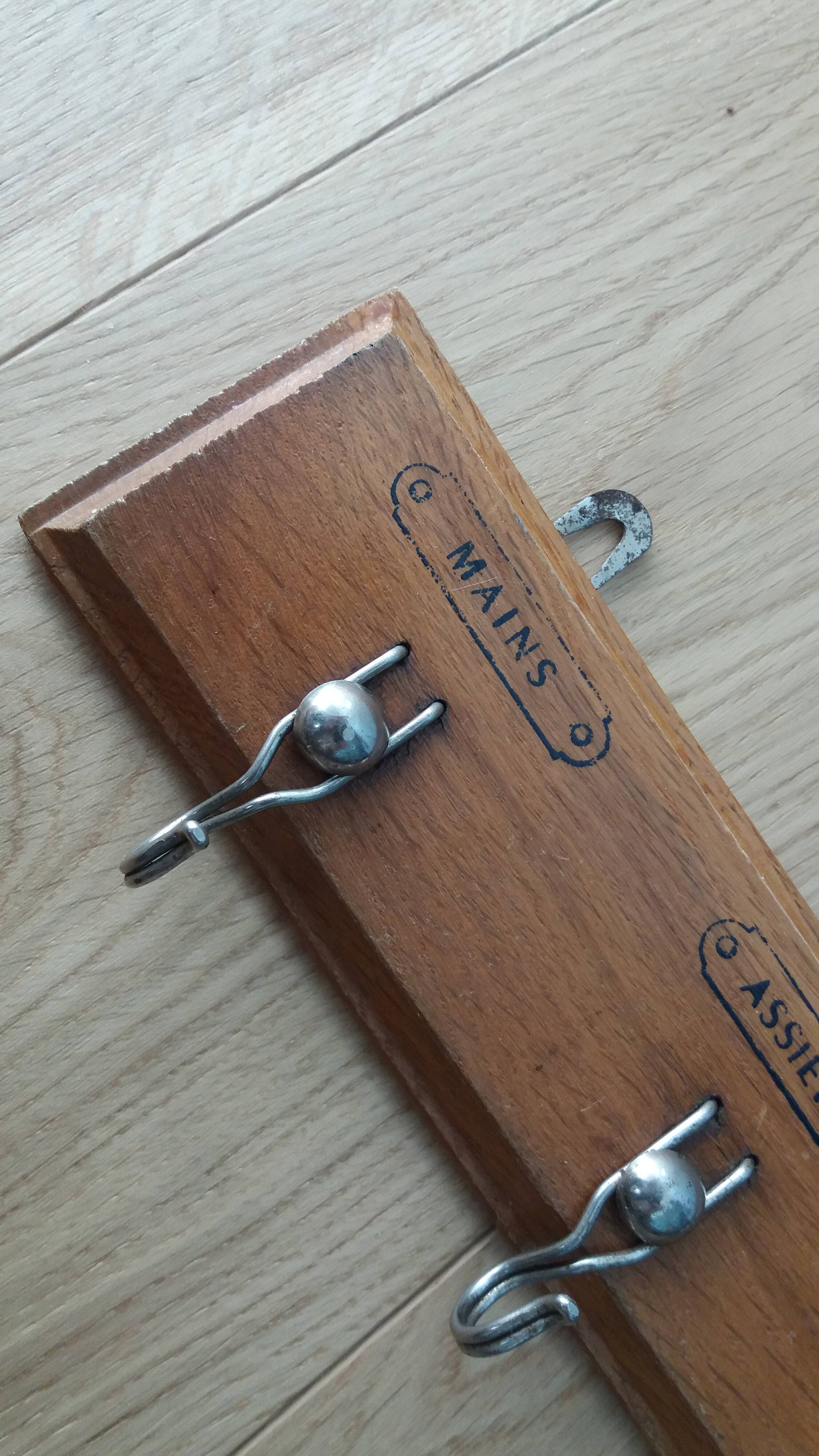 Tea towel holder, wooden and metal towel hook.