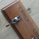 Tea towel holder, wooden and metal towel hook.