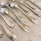 Large spoons and forks, silver metal