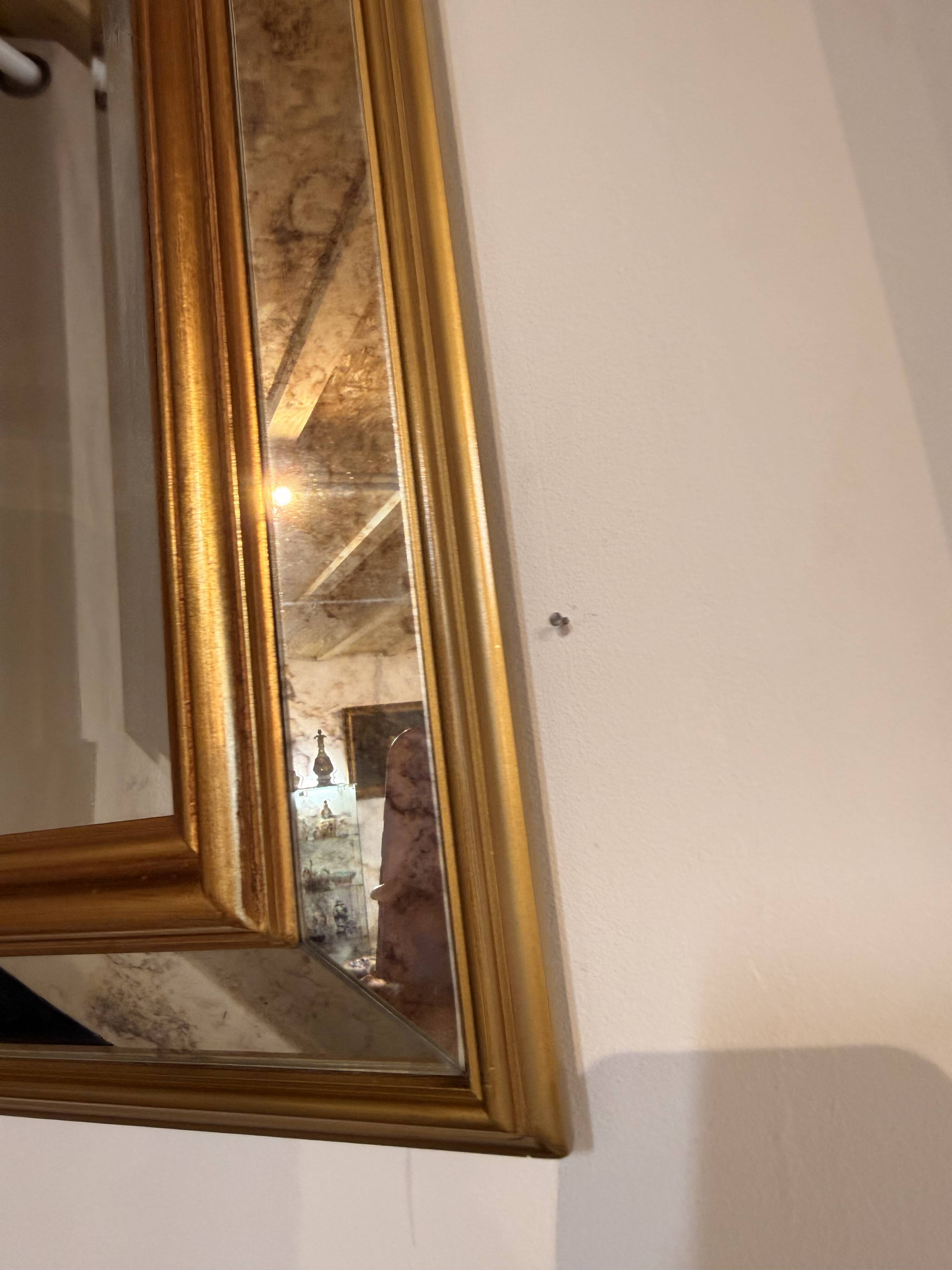 Grand miroir biseauté – cadre doré – années 1970