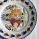 2 decorative plates in Quimper earthenware, signed HB Henriot.