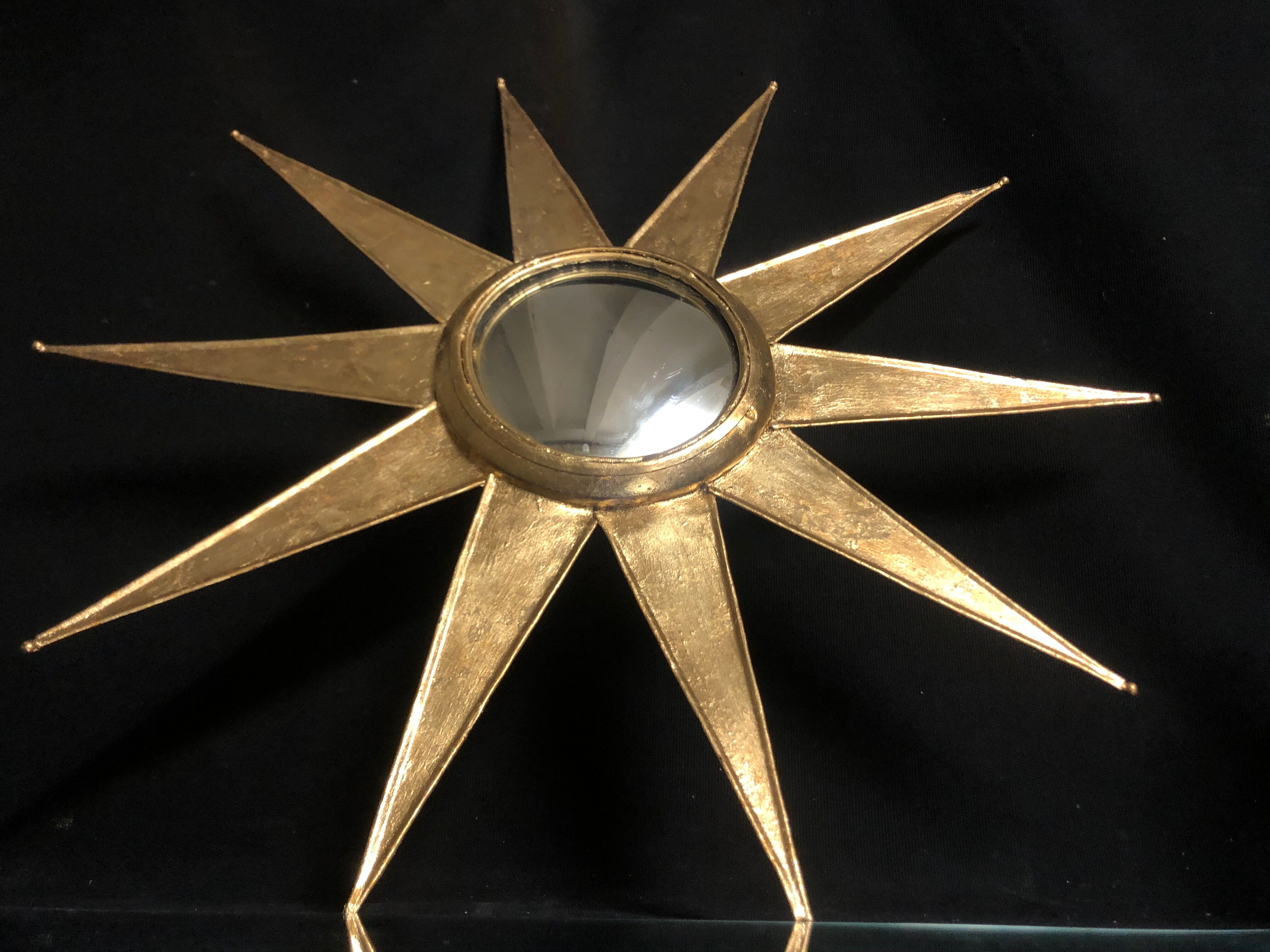 Mirror sun deforming 61 cm in gold metal with gold leaf said witch