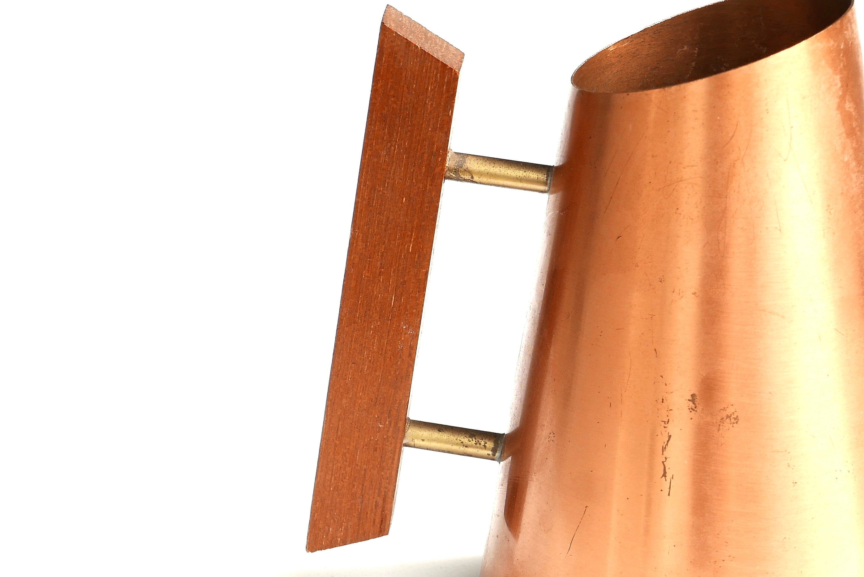 Modernist copper watering can, wooden handle, 1950s