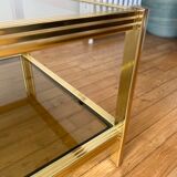 Gold metal coffee table and smoked glass
