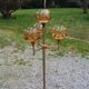 1970s design floor lamp in chrome metal with gold and orange, featuring 4 glass tulips.