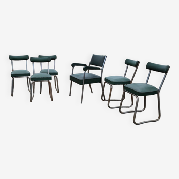 Série chaises et un fauteuil skaï vert industriel vintage