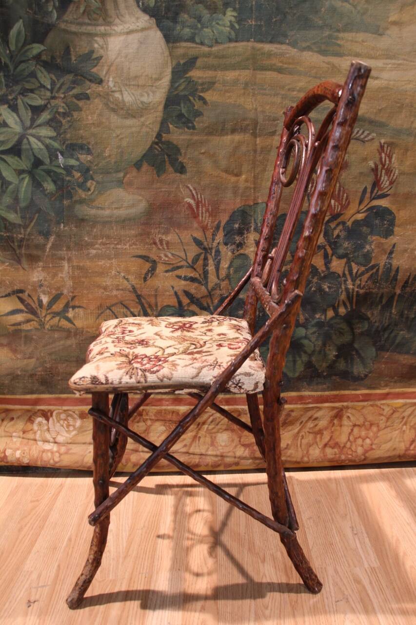 Folk art chair, black forest in branches