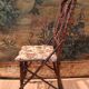 Folk art chair, black forest in branches
