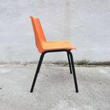 Orange plastic shell chair