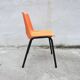 Orange plastic shell chair