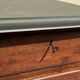 Modernist desk in wood and green moleskin upholstery