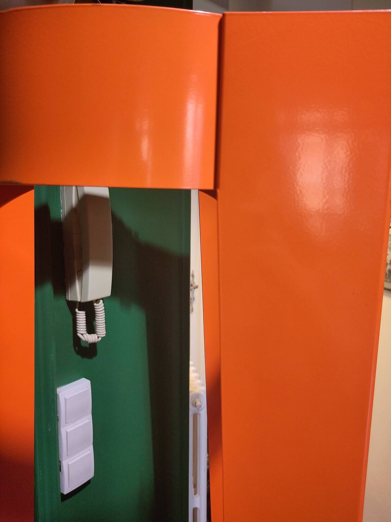 Orange designer coat rack 'Chase G' by Van Esch from the 2000s.