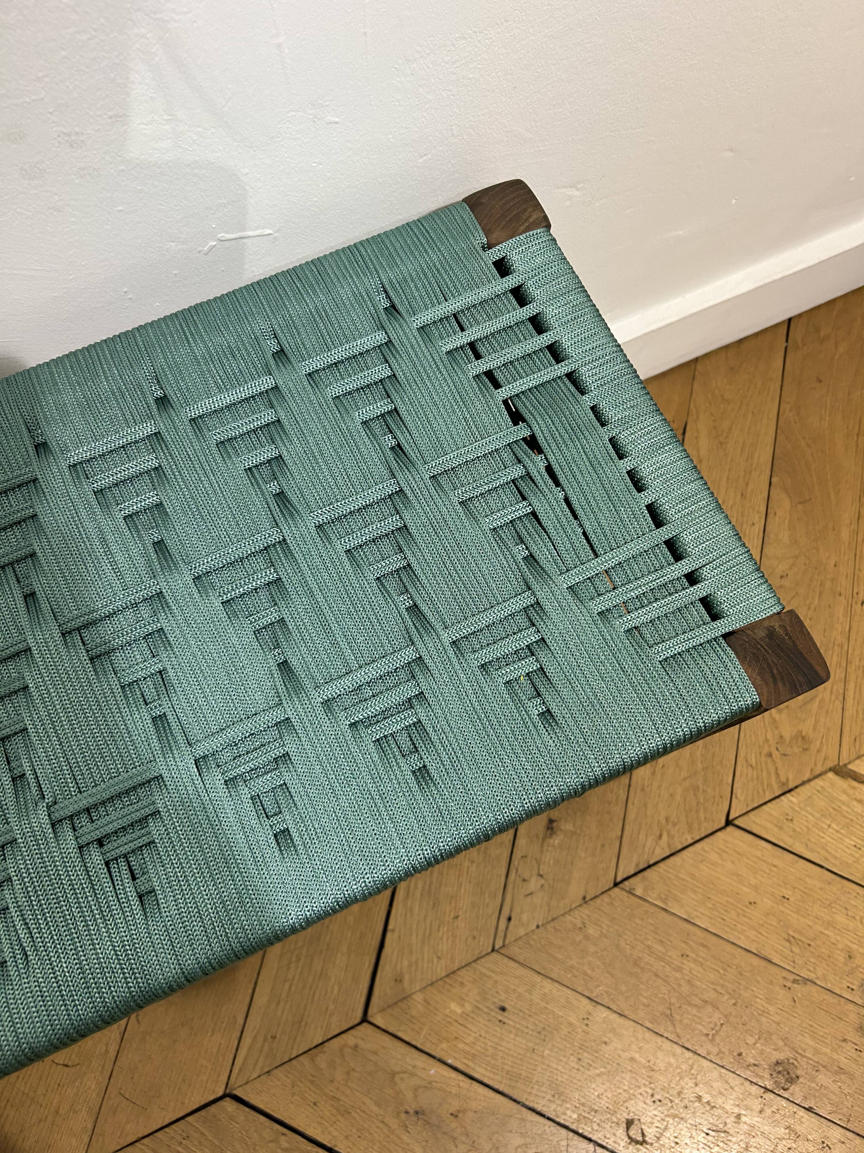 Bench in blue-green woven walnut