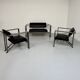 Brutalist living room with faux metal armchairs designed by Karl Friedrich Forster