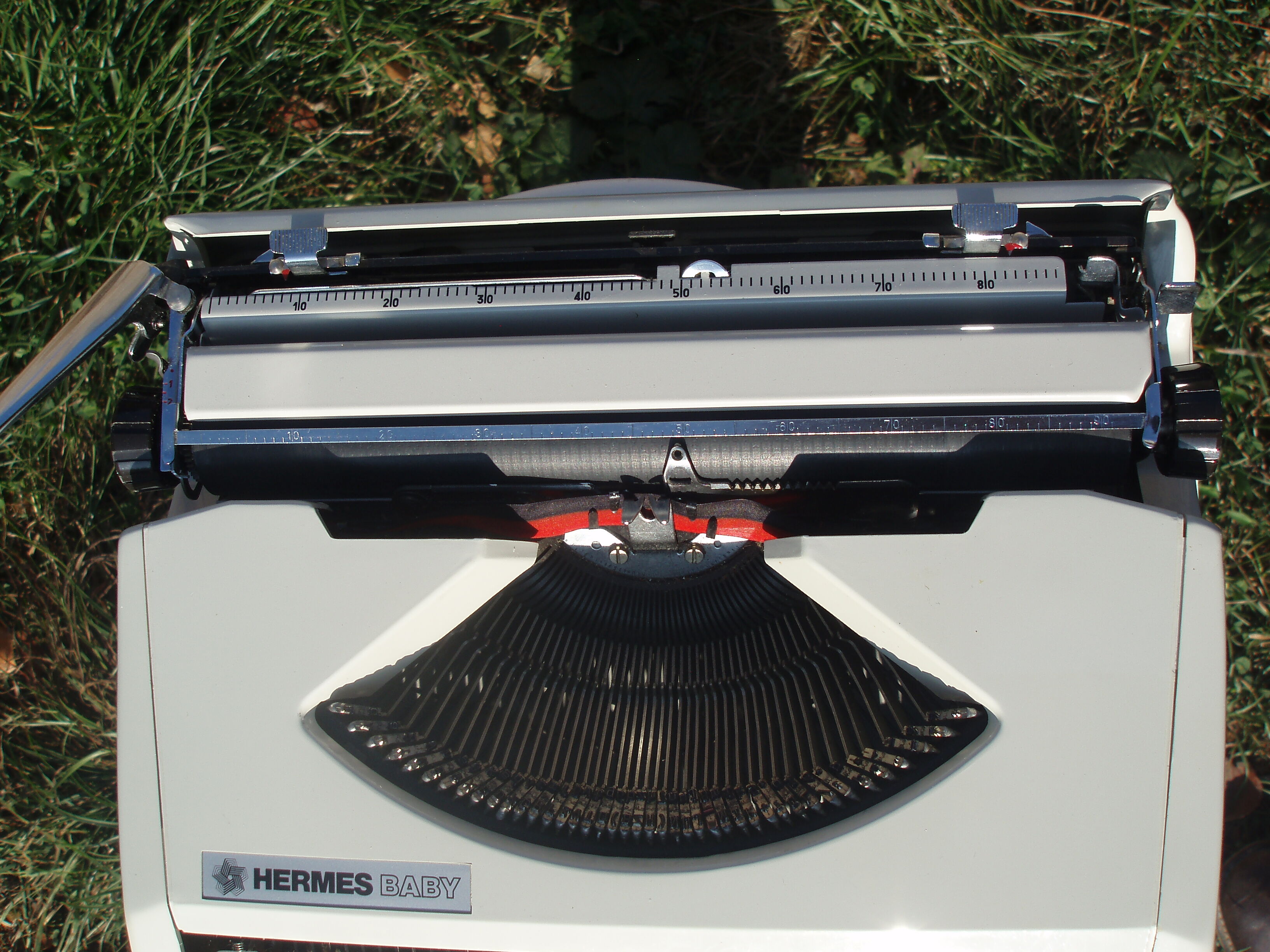 Baby hermes typewriter with manual job and his bag
