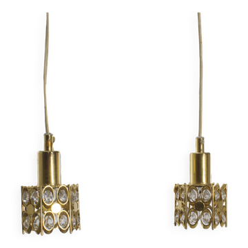 Two pendant lights in gilded brass and crystal, by Palwa, design 1960